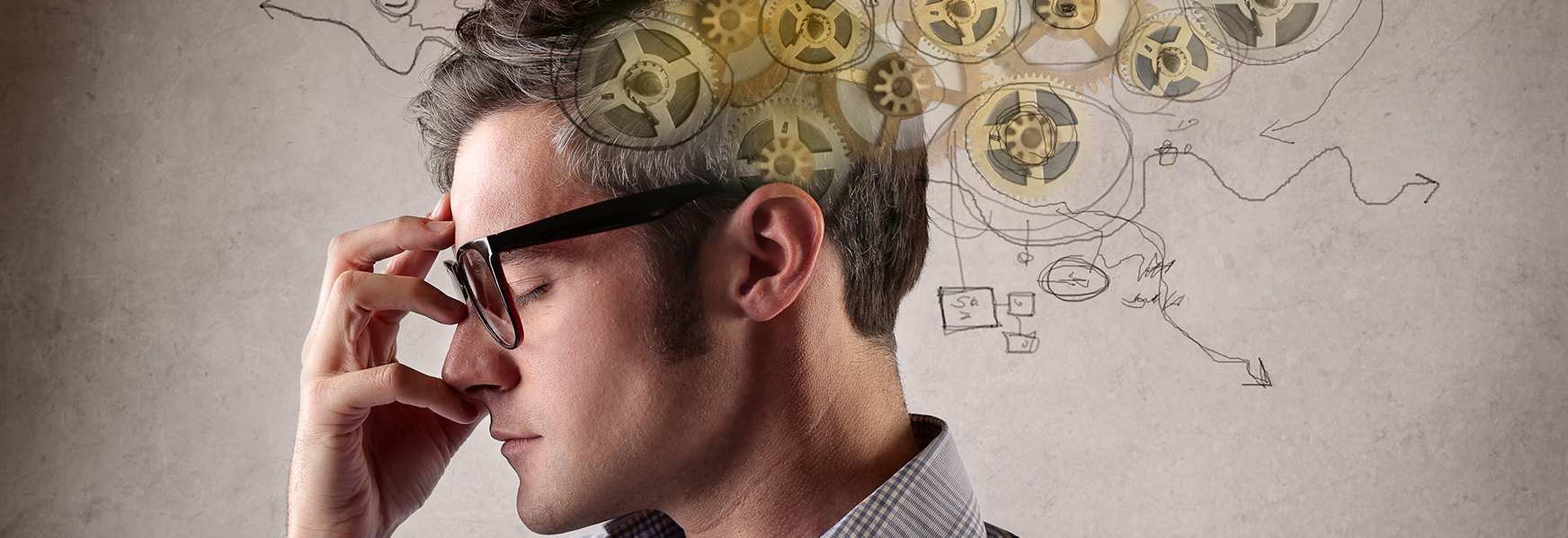 Man thinking with cogs and scribbled notes surrounding head