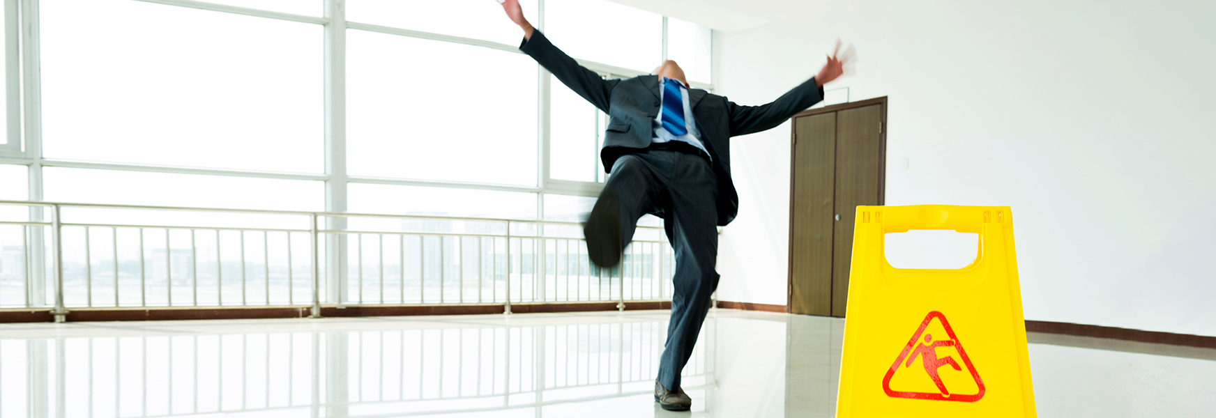 man slipping on floor