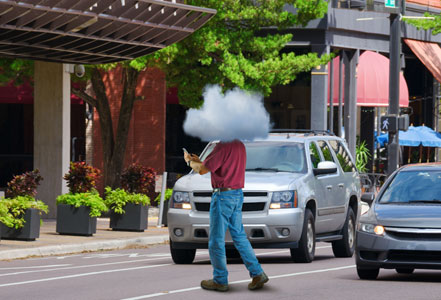 Pedestrian walking in traffic