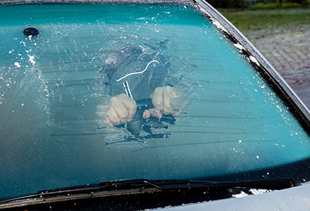 Ice all over car windshield