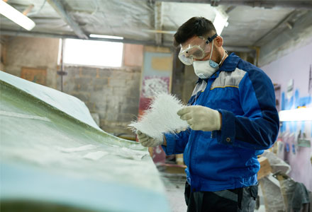 Man repairing boat