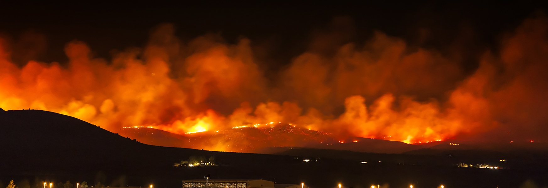 mountainous wildfires burning at night