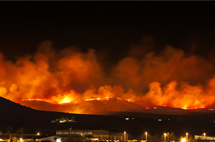 mountainous wildfires burning at night
