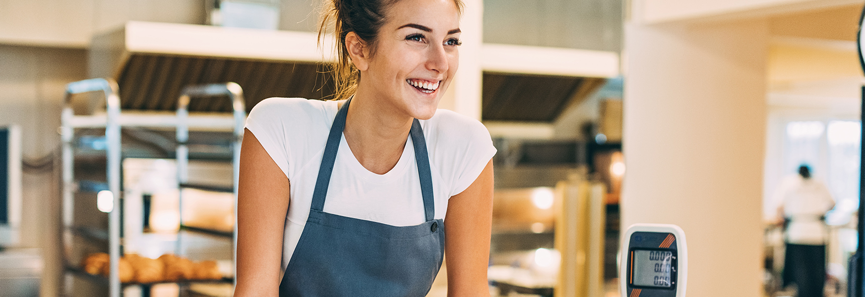 Young Girl Working At Bakery