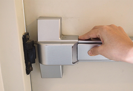 Hand opening closed office fire door