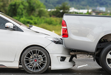 Car and truck involved in rear-end collision