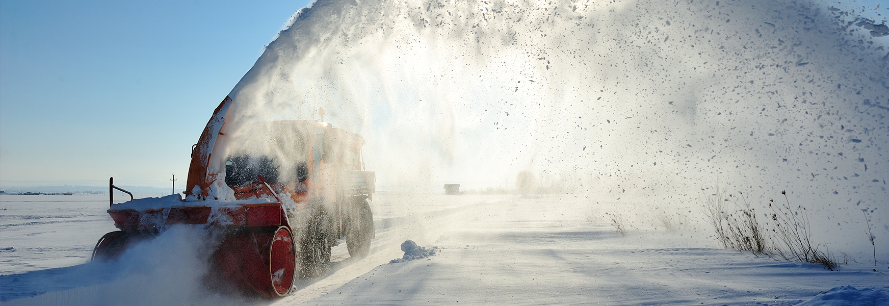 Snow machine removing snow