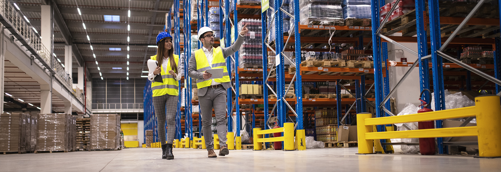 Factory workers performing safety inspection