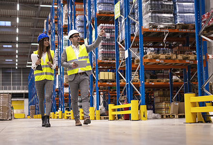 Factory workers performing safety inspection