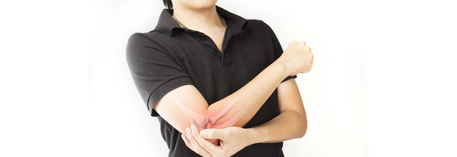 Person with tennis elbow pain