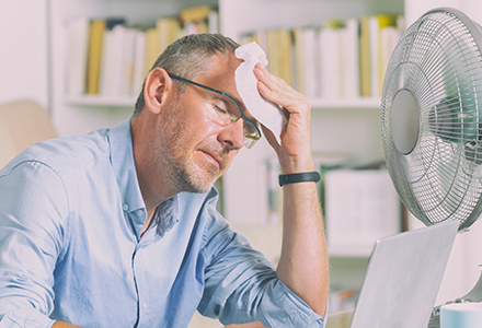 Office worker struggling with warm weather