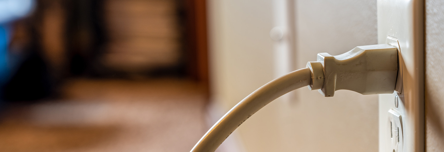 Cord plugged into electrical outlet