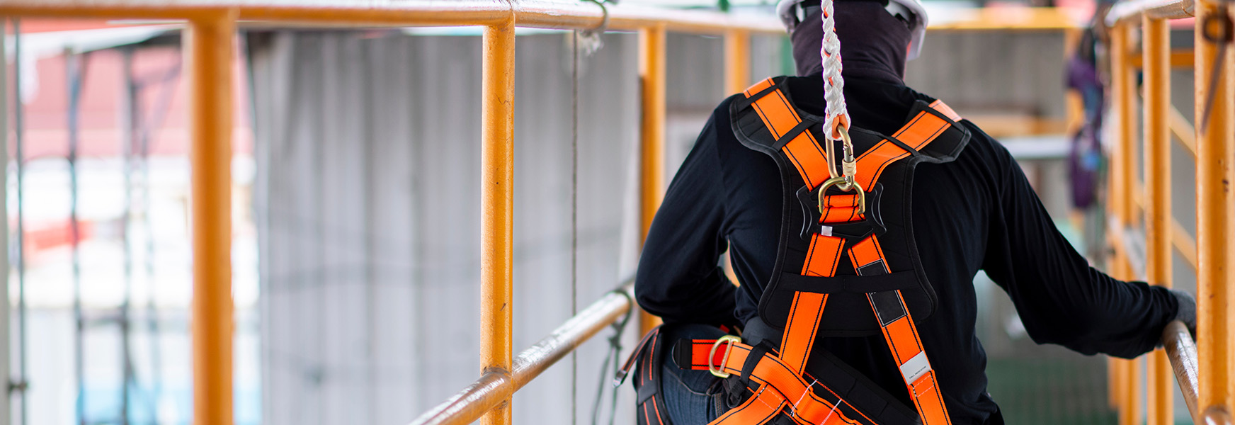 Working wearing harness while working at heights