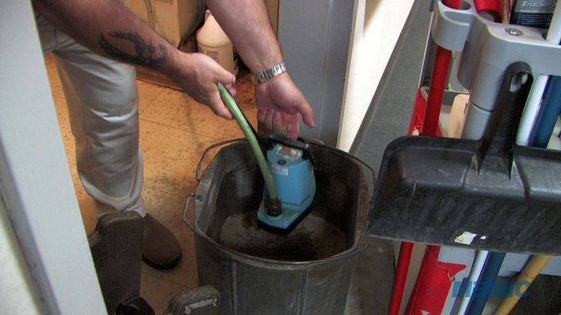 Using pumps to pump out a mop bucket.