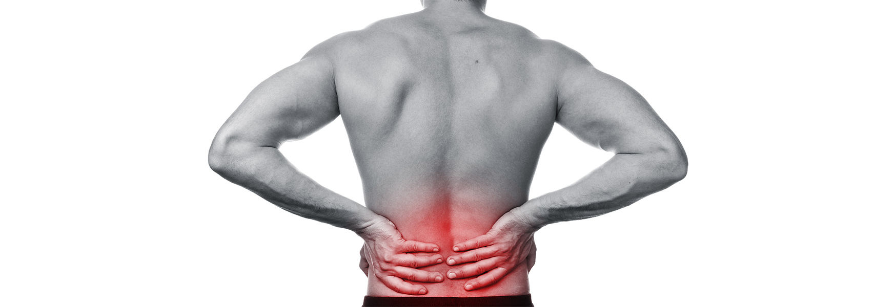 Man holding lower back due to pain