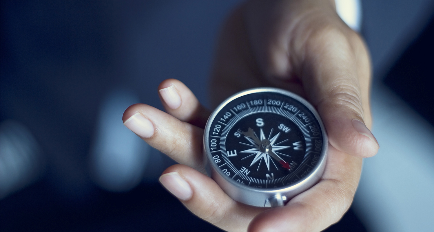 hand holding watch