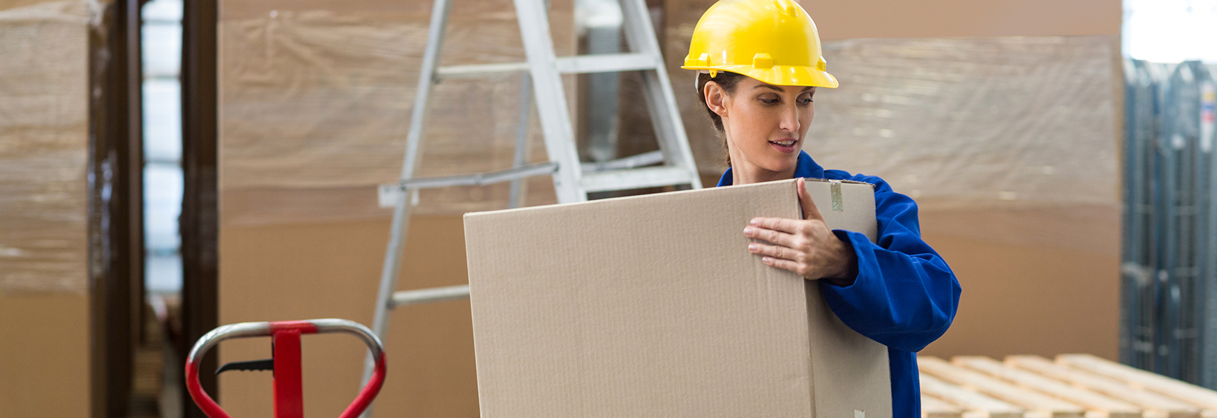 Woman lifting box in power zone
