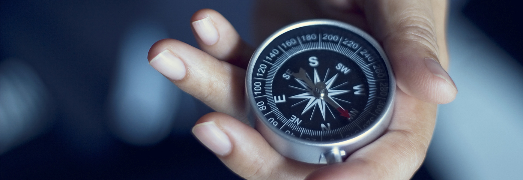 Supervisor looking at compass