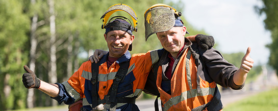 Young workers wearing PPE
